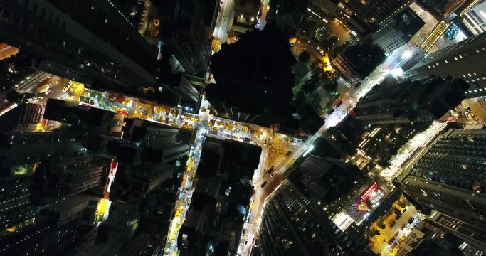 AERIAL. Brid eyes view from drone of Hong Kong city at night time