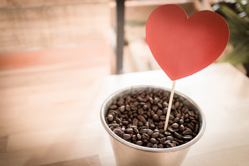 heart tag in coffee bucket , copy space, vintage , valentine day