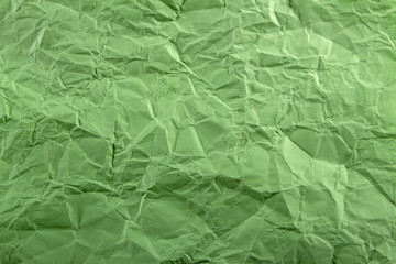 Green crepe Wrinkled Paper Texture background abstract