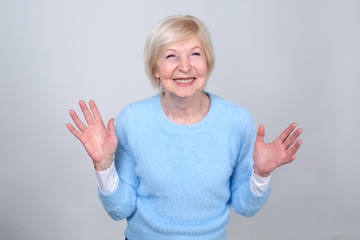 Happy cheerful woman. Senior woman 70 years of age.