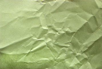 Green crepe Wrinkled Paper Texture background abstract