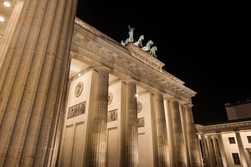 Germany, Berlin, Pariser Platz: Detail of illuminated Brandenburg Gate (Brandenburger Tor) at night in the middle of the German capital. The monument was built by king Frederick William II.