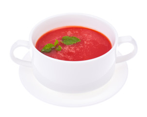Delicious tomato soup on white background