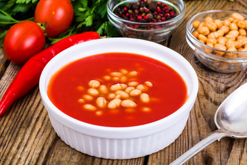 Canned white beans in tomato sauce. Spicy food