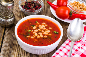 Canned white beans in tomato sauce. Spicy food