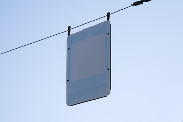 Blank road sign over blue sky background. Empty street sign template.