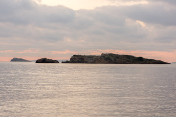A golden sunrise in the sea of Ibiza