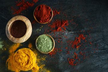 colorful spice background and olive wood east