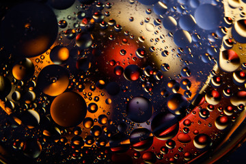 Abstract space background. Water drops of different colours