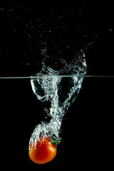 tomato in water splash