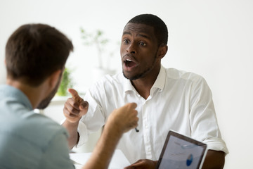 African american businessman disagreeing arguing debating during office negotiations, black...