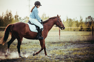 Girl riding a horse