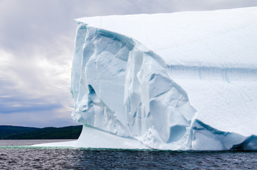 Iceberg Floating in Ocean Bay
