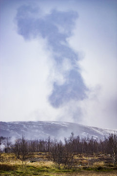 Steam Rising from a Geyser at Strokkur Geysir Field in Iceland's Golden Circle