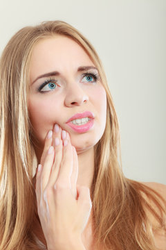 Toothache. Woman suffering from tooth pain