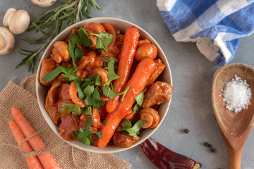 Spicy turkey goulash with mushrooms and carrots in tomato sauce.