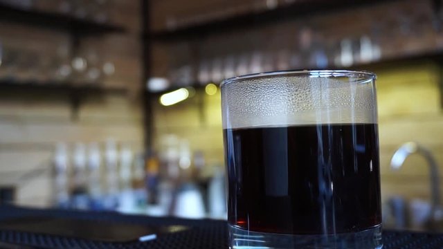 Coffee glass vapor barista appears in the background 