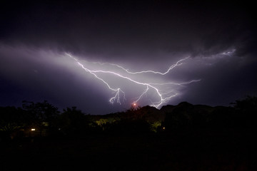 Fototapeta na wymiar lightning strike in a dark sky