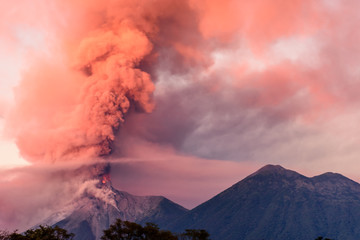 Fuego volcano erupting at dawn, near Antigua, Guatemala - obrazy, fototapety, plakaty