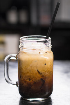 Thai Iced Coffee In Mason Jar, Dark Background