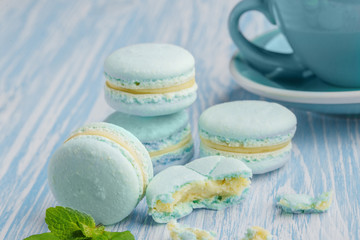 Blue macarons. French delicate dessert for Breakfast in the morning light