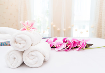 Fototapeta na wymiar Spa massage setting product with rolled, towel, compress balls ,Ingredients for cosmetics, body massage and thai spa.