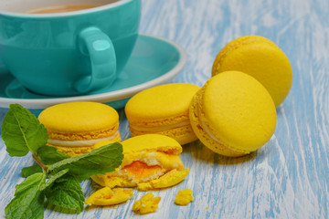 Yellow macarons. French delicate dessert for Breakfast in the morning light