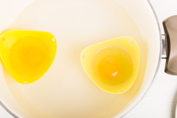 Silicone Egg Poachers with Eggs