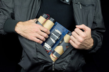 terrorist hides a bomb on his body, make bomb concept
