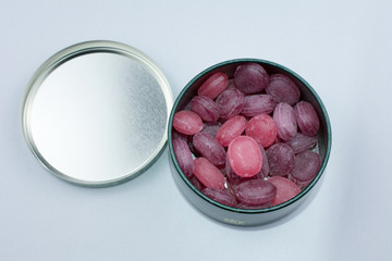 red lollipops white background selective focus closeup