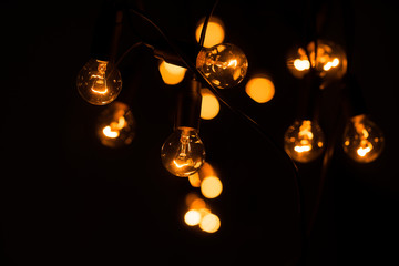 glowing light bulbs in the dark