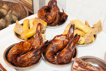 Duck and Chicken head in the street market