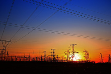 Fototapeta premium Sunset silhouette of pylon