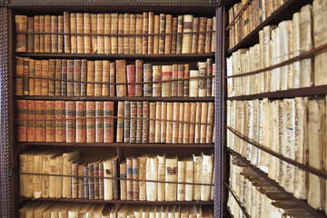 Antique books in a library.