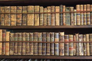 Antique books in a library.