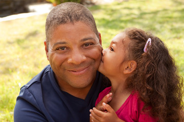 African American father and his daughter.