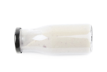 White sauce in a bottle isolated