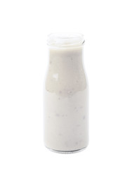 White sauce in a bottle isolated