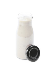 White sauce in a bottle isolated