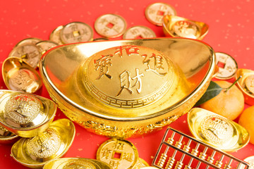 Chinese gold ingot mean symbols of wealth and prosperity.Chinese calligraphy Translation:good bless for money