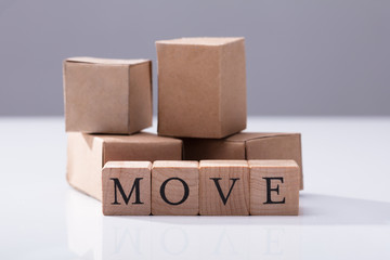 Close-up Of Move Text On Wooden Blocks
