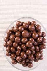 chocolate balls. chocolate balls in bowl on a background