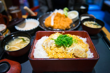 Japanese fried pork with egg over rice or Katsudon