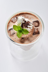 Iced cocoa in a glass on white background