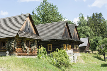 Fototapeta na wymiar Village with wooden houses.