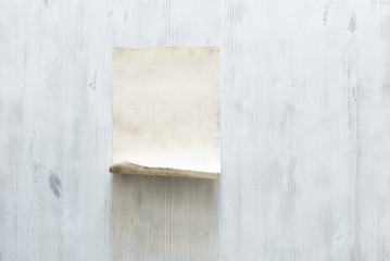 old paper on white wall