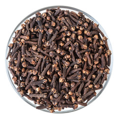 Dried cloves in glass bowl isolated on white background with clipping path