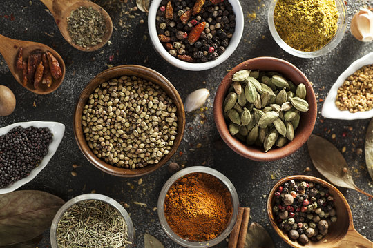 spices, variety of colorful aromatic spices, pepper, mustard, chili, coriander, cinnamon, cardamom