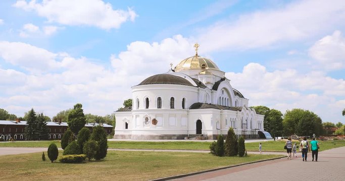 Brest, Belarus. People Walking Near Garrison Cathedral St. Nicholas Church In Memorial Complex Brest Hero Fortress In Sunny Summer Day