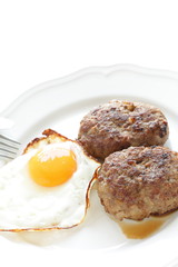 homemade patty and sunny side up fried egg